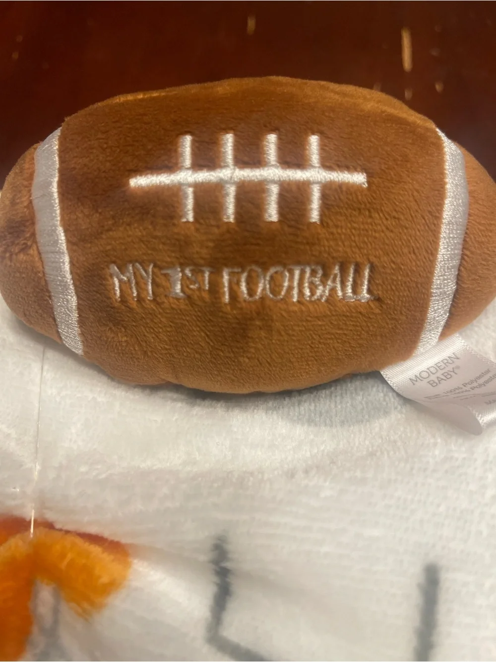 Football Baby Bundle: Blanket with football rattle and 3 pc Rayon Football Set.